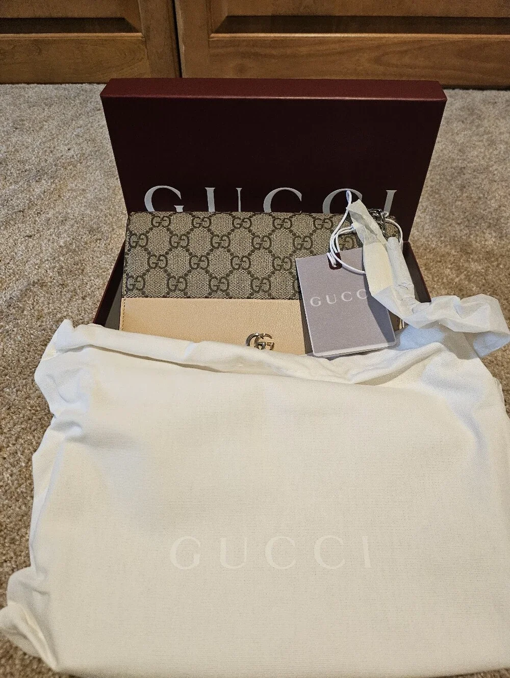 New In Box Gucci Beige Leather Trim GG Canvas Wallet with Gold Hardware